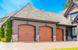 Triple garage with large tiled roof