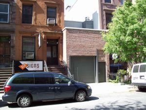 American street with modest garage door