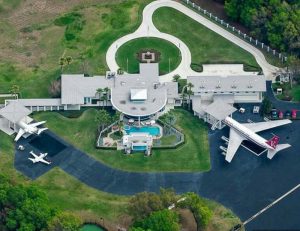 John Travolta's house with planes parked outside