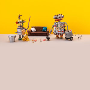 Two robots with vacuums & mop cleaning a living area