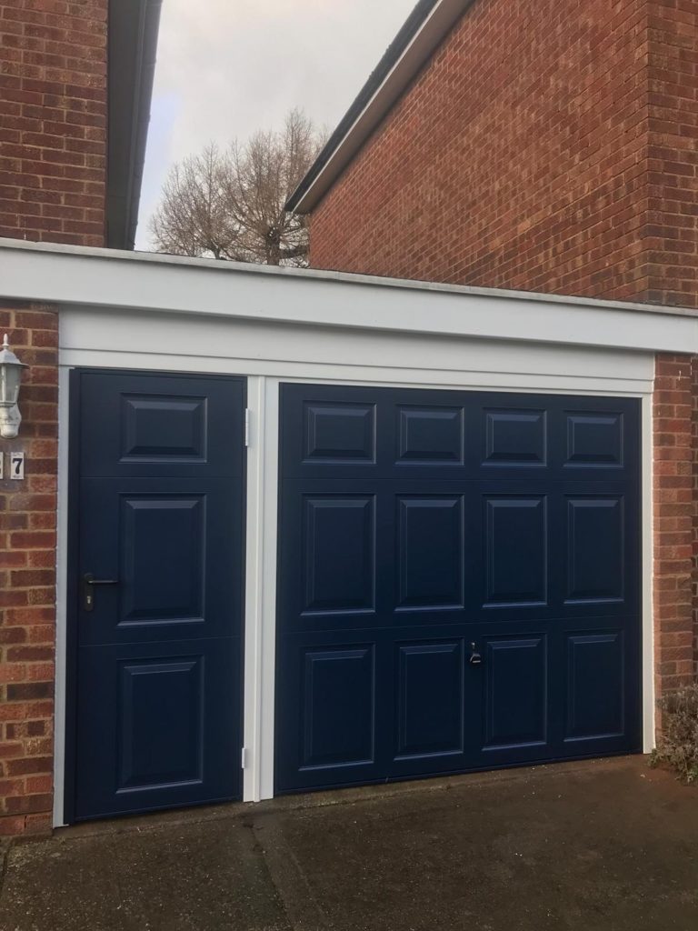 Personnel Side Navy Garage Door With Black Handle