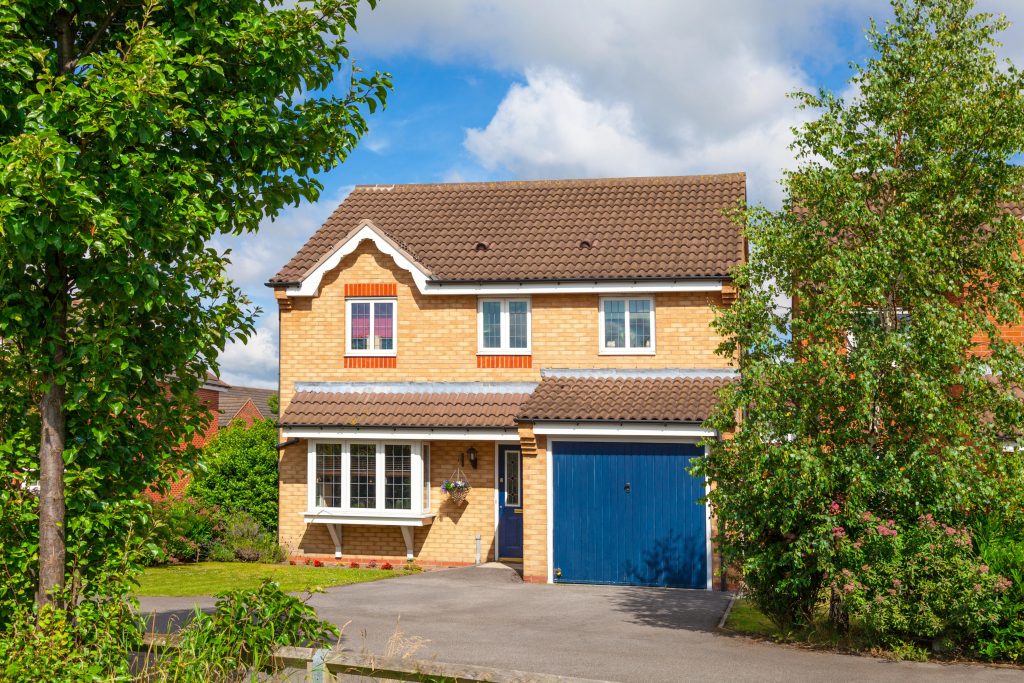 Modern house with blue garage